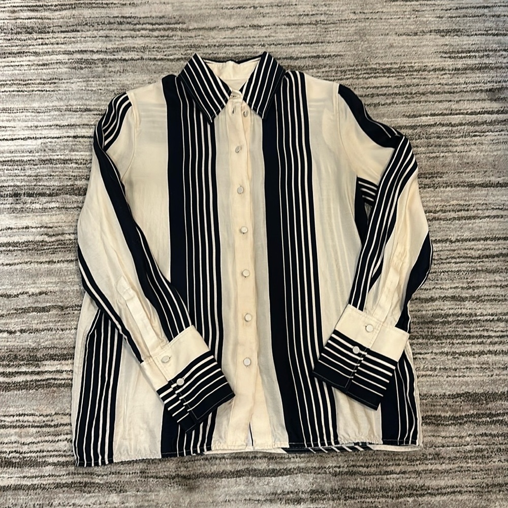 COS cream and black blouse